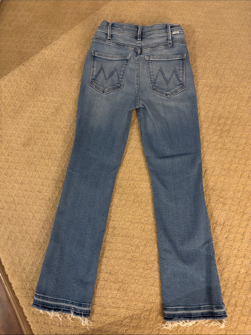 MOTHER Hustler Light Blue Flared Jeans with Fringe Hem